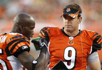 CINCINNATI - AUGUST 31:  Carson Palmer #9 and Chad Johnson #85 of the Cincinnati Bengals talk on the sideline during a NFL preseason game against the Indianapolis Colts on August 31, 2007 at Paul Brown Stadium in Cincinnati, Ohio. (Photo by Joe Robbins/Getty Images)