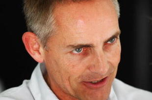 SAKHIR, BAHRAIN - APRIL 26:  (L-R) McLaren Mercedes Team Principal Martin Whitmarsh is seen in his team garage before the Bahrain Formula One Grand Prix at the Bahrain International Circuit on April 26, 2009 in Sakhir, Bahrain.  (Photo by Clive Mason/Getty Images)