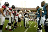 JACKSONVILLE, FL - AUGUST 9: Referee Walt Coleman tosses the coin as the Jacksonville Jaguars host the Atlanta Falcons at Jacksonville Municipal Stadium on August 9, 2008 in Jacksonville, Florida.   (Photo by Al Messerschmidt/Getty Images) 