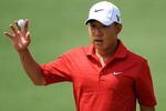 AUGUSTA, GA - APRIL 11:  Anthony Kim waves to the crowd on the second green during the third round of the 2009 Masters Tournament at Augusta National Golf Club on April 11, 2009 in Augusta, Georgia.  (Photo by Harry How/Getty Images)
