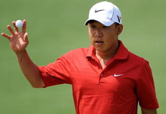 AUGUSTA, GA - APRIL 11:  Anthony Kim waves to the crowd on the second green during the third round of the 2009 Masters Tournament at Augusta National Golf Club on April 11, 2009 in Augusta, Georgia.  (Photo by Harry How/Getty Images)