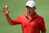 AUGUSTA, GA - APRIL 11:  Anthony Kim waves to the crowd on the second green during the third round of the 2009 Masters Tournament at Augusta National Golf Club on April 11, 2009 in Augusta, Georgia.  (Photo by Harry How/Getty Images)