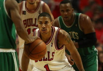 CHICAGO - APRIL 23: Derrick Rose #1 of the Chicago Bulls sets up in a defensive stance against the Boston Celtics in Game Three of the Eastern Conference Quarterfinals during the 2009 NBA Playoffs at the United Center on April 23, 2009 in Chicago, Illinois. The Celtics defeated the Bulls 107-86. NOTE TO USER: User expressly acknowledges and agreees that, by downloading and/or using this Photograph, User is consenting to the terms and conditions of the Getty Images License Agreement. (Photo by Jonathan Daniel/Getty Images)