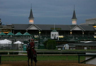 LOUISVILLE, KY - APRIL 28:  A horse walks off of the track on a morning of rain during the training for the 135th Kentucky Derby at Churchill Downs on April 28, 2009 in Louisville, Kentucky.  (Photo by Andy Lyons/Getty Images)