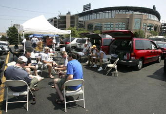 CHICAGO - JUNE 24: Fans tailgate in the parking lot before the Chicago White Sox take on the Chicago Cubs at U.S. Cellular Field June 24, 2005 in Chicago, Illinois. (Photo by Jonathan Daniel/Getty Images)