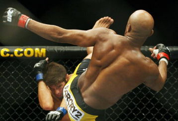 CHICAGO- OCTOBER 25:  Anderson Silva fights Patrick Cote in the Middleweight Title Bout at UFC's Ultimate Fight Night at Allstate Arena on October 25, 2008 in Chicago, Illinois. (Photo by Tasos Katopodis/Getty Images)
