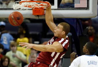MEMPHIS, TN - MARCH 29:  Blake Griffin #23 of the Oklahoma Sooners dunks the ball over Ed Davis #32 of the North Carolina Tar Heels in the second half during the NCAA Men's Basketball Tournament South Regional Final at the FedExForum on March 29, 2009 in Memphis, Tennessee.  (Photo by Joe Murphy/Getty Images)