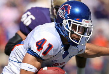 SEATTLE - SEPTEMBER 08:  Running back Ian Johnson #41 of the Boise State Broncos rushes against the Washington Huskies at Husky Stadium on September 8, 2007 in Seattle, Washington. The Huskies defeated the Broncos 24-10.  (Photo by Otto Greule Jr/Getty Images)  
