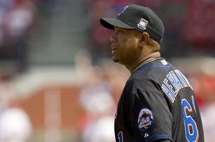 ST. LOUIS, MO - APRIL 23: Starting pitcher Livan Hernandez #61 of the New York Mets reacts to giving up a solo home run to Rick Ankiel #24 of the St. Louis Cardinals on April 23, 2009 at Busch Stadium in St. Louis, Missouri. The Cardinals beat the Mets 12-8.  (Photo by Dilip Vishwanat/Getty Images)