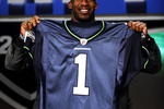 NEW YORK - APRIL 25:  Seattle Seahawks draft pick Aaron Curry poses with his new jersey at Radio City Music Hall for the 2009 NFL Draft on April 25, 2009 in New York City  (Photo by Jeff Zelevansky/Getty Images)