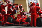 SAKHIR, BAHRAIN - APRIL 26:  Kimi Raikkonen of Finland and Ferrari comes in for a pitstop during the Bahrain Formula One Grand Prix at the Bahrain International Circuit on April 26, 2009 in Sakhir, Bahrain.  (Photo by Mark Thompson/Getty Images)
