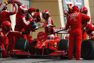 SAKHIR, BAHRAIN - APRIL 26:  Kimi Raikkonen of Finland and Ferrari comes in for a pitstop during the Bahrain Formula One Grand Prix at the Bahrain International Circuit on April 26, 2009 in Sakhir, Bahrain.  (Photo by Mark Thompson/Getty Images)