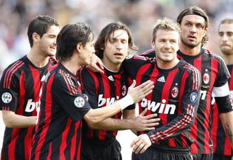 SIENA, ITALY - MARCH 15: David Beckham and fellow team mates of Milan Team celebrate during the Serie A match between AC Siena and AC Milan at the Artemio Franchi Stadio on MARCH 15, 2009 in Siena, Italy. (Photo by New Press/Getty Images)