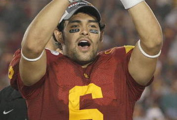 PASADENA, CA - JANUARY 1:  Mark Sanchez #6 of the USC Trojans rejoices as he holds te Offensive Player of the Game Trophy after the game against the Penn State Nittany Lions on January 1, 2009 at the Rose Bowl in Pasadena, California.  USC won 38-24.  (Photo by Jeff Golden/Getty Images)