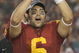 PASADENA, CA - JANUARY 1:  Mark Sanchez #6 of the USC Trojans rejoices as he holds te Offensive Player of the Game Trophy after the game against the Penn State Nittany Lions on January 1, 2009 at the Rose Bowl in Pasadena, California.  USC won 38-24.  (Photo by Jeff Golden/Getty Images)