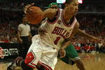 CHICAGO - APRIL 26: Derrick Rose #1 of the Chicago Bulls drives past Rajon Rondo #9 of the Boston Celtics in Game Four of the Eastern Conference Quarterfinals during the 2009 NBA Playoffs at the United Center on April 26, 2009 in Chicago, Illinois. The Bulls defeated the Celtics 121-118 in double overtime. NOTE TO USER: User expressly acknowledges and agreees that, by downloading and/or using this Photograph, User is consenting to the terms and conditions of the Getty Images License Agreement.  Photo by Jonathan Daniel/Getty Images)