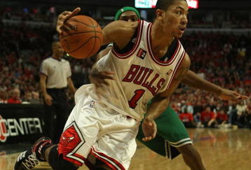 CHICAGO - APRIL 26: Derrick Rose #1 of the Chicago Bulls drives past Rajon Rondo #9 of the Boston Celtics in Game Four of the Eastern Conference Quarterfinals during the 2009 NBA Playoffs at the United Center on April 26, 2009 in Chicago, Illinois. The Bulls defeated the Celtics 121-118 in double overtime. NOTE TO USER: User expressly acknowledges and agreees that, by downloading and/or using this Photograph, User is consenting to the terms and conditions of the Getty Images License Agreement.  Photo by Jonathan Daniel/Getty Images)
