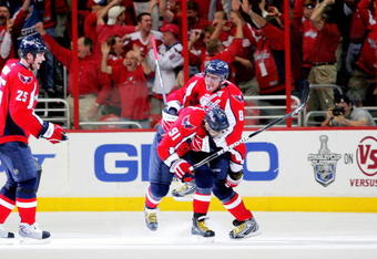 WASHINGTON - APRIL 28:  Alex Ovechkin #8 and Sergei Fedorov #91 of the Washington Capitals celebrate the game winning goal against the New York Rangers during Game Seven of the Eastern Conference Quarterfinal Round of the 2009 Stanley Cup Playoffs on April 28, 2009 at the Verizon Center in Washington,  DC.  (Photo by Len Redkoles/Getty Images)