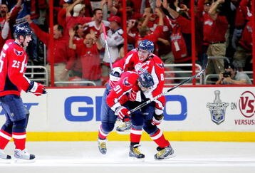 WASHINGTON - APRIL 28:  Alex Ovechkin #8 and Sergei Fedorov #91 of the Washington Capitals celebrate the game winning goal against the New York Rangers during Game Seven of the Eastern Conference Quarterfinal Round of the 2009 Stanley Cup Playoffs on April 28, 2009 at the Verizon Center in Washington,  DC.  (Photo by Len Redkoles/Getty Images)