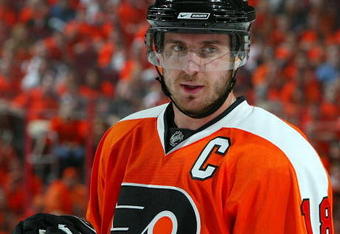 PHILADELPHIA - APRIL 25:  Mike Richards #18 of the Philadelphia Flyers skates against the Pittsburgh Penguins during Game Six of the Eastern Conference Quarterfinal Round of the 2009 NHL Stanley Cup Playoffs  at the Wachovia Center on April 25, 2009 in Philadelphia, Pennsylvania. The Penguins defeated the Flyers 5-3 to win the series 4 games to 2.  (Photo by Jim McIsaac/Getty Images)