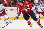WASHINGTON - APRIL 24:  Alex Ovechkin #8 of the Washington Capitals skates the puck past Ryan Callahan #24 of the New York Rangers during Game Five of the Eastern Conference Quarterfinal Round of the 2009 Stanley Cup Playoffs on April 24, 2009 at the Verizon Center in Washington,  DC.  (Photo by Len Redkoles/Getty Images)