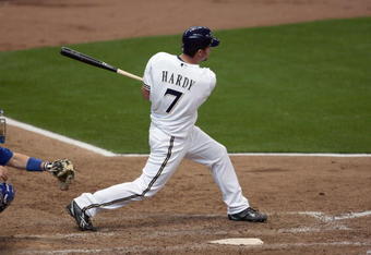 MILWAUKEE - APRIL 10: J.J. Hardy #7 of the Milwaukee Brewers swings at the pitch against the Chicago Cubs during the Opening Day game on April 10, 2009 at Miller Park in Milwaukee, Wisconsin. The Brewers defeated the Cubs 4-3. (Photo by Jonathan Daniel/Getty Images)