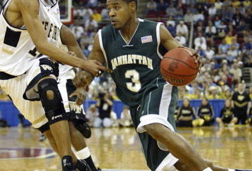 RALEIGH, NC - MARCH 20:  Luis Flores #3 of the Manhattan Jaspers drives to the basket during the second round game of the NCAA Division I Men's Basketball Tournament against Jamaal Levy #10 of the Wake Forest Demon Deacons at RBC Center on March 20, 2004 in Raleigh, North Carolina.  (Photo by Ezra Shaw/Getty Images)