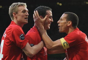 MANCHESTER, ENGLAND - APRIL 29:  John O' Shea of Manchester United is congratulated by his team mates after scoring the opening goal during the UEFA Champions League Semi Final First Leg match between Manchester United and Arsenal at Old Trafford on April 29, 2009 in Manchester, England.  (Photo by Shaun Botterill/Getty Images)