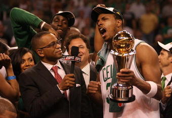 BOSTON - JUNE 17:  Paul Pierce #34 of the Boston Celtics answers question from ESPN broadcaster Stuart Scott as Pierce holds the NBA Finals MVP trophy after defeating the Los Angeles Lakers in Game Six of the 2008 NBA Finals on June 17, 2008 at TD Banknorth Garden in Boston, Massachusetts. NOTE TO USER: User expressly acknowledges and agrees that, by downloading and/or using this Photograph, user is consenting to the terms and conditions of the Getty Images License Agreement.  (Photo by Elsa/Getty Images)