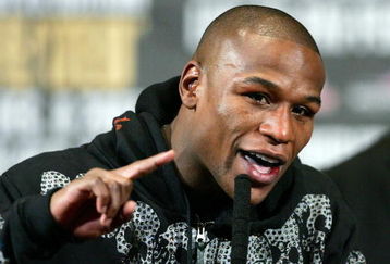LAS VEGAS - DECEMBER 08:  Floyd Mayweather Jr. speaks during his post fight news conference after knocking out Ricky Hatton in the 10th round of their WBC world welterweight championship fight at the MGM Grand Garden Arena on December 8, 2007 in Las Vegas, Nevada.  (Photo by Ethan Miller/Getty Images)