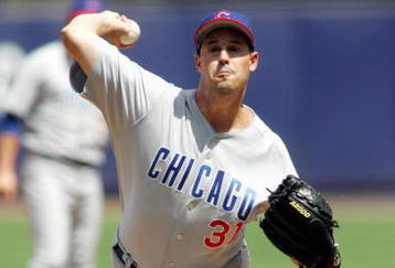 FLUSHING, NY - AUGUST 6:  Pitcher Greg Maddux #31 of the Chicago Cubs delivers a pitch against the New York Mets during the game at Shea Stadium on August 6, 2005 in Flushing, New York. The Mets defeated the Cubs 2-0.(Photo by Jim McIsaac /Getty Images)     
