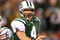 EAST RUTHERFORD, NJ - DECEMBER 28: Brett Favre #4 of The New York Jetspasses the ball against The Miami Dolphins during their game on December 28, 2008 at Giants Stadium in East Rutherford, New Jersey. (Photo by Al Bello/Getty Images)