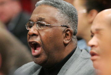 NEW YORK - MARCH 10:  Former head coach John Thompson II of the Georgetown Hoyas shouts from the stands his former teams takes on the Connecticut Huskies during the quaterfinal round of the Big East Men's Basketball Championship on March 10, 2005 at Madison Square Garden in New York City.  (Photo by Jim McIsaac/Getty Images)