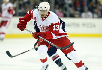 COLUMBUS, OH - APRIL 23:  Pavel Datsyuk #13 of the Detroit Red Wings skates against the Columbus Blue Jackets during Game Four of the Western Conference Quarterfinals of the 2009 Stanley Cup Playoffs on April 23, 2009 at the Nationwide Arena in Columbus, Ohio. (Photo by Claus Andersen/Getty Images)