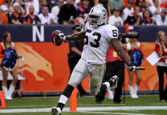 DENVER - SEPTEMBER 16:  Thomas Howard #53 of the Oakland Raiders glides into the enzone after returning an interception for a touchdown against the Denver Broncos as the Broncos defeated the Raiders 23-20 in overtime during week two NFL action at Invesco Field at Mile High on September 16, 2007 in Denver, Colorado.  (Photo by Doug Pensinger/Getty Images)