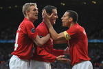 MANCHESTER, ENGLAND - APRIL 29:  John O' Shea of Manchester United is congratulated by his team mates after scoring the opening goal during the UEFA Champions League Semi Final First Leg match between Manchester United and Arsenal at Old Trafford on April 29, 2009 in Manchester, England.  (Photo by Shaun Botterill/Getty Images)