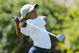 SAN DIEGO - July 17:  Cheyenne Woods, niece of Tiger Woods, tees off the 10th hole during the 2nd Round of the Junior World Golf Championships on July 17, 2002 at the Lawrence Welk Resort in San Diego, California.  (Photo by Dolanld Miralle/Getty Images)