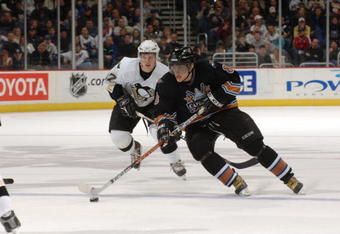 WASHINGTON - FEBRUARY 11:  Alex Ovechkin #8 of the Washington Capitals skates with the puck against Sidney Crosby #87 of the Pittsburgh Penguins at MCI Center February 11, 2006 in Washington, DC.  (Photo by Mitchell Layton/Getty Images)