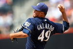 NEW YORK - APRIL 18:  Yovani Gallardo #49 of the Milwaukee Brewers deals a pitch against the New York Mets on April 18, 2009 at Citi Field in the Flushing neighborhood of the Queens borough of New York City.  (Photo by Jim McIsaac/Getty Images)