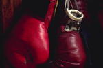 UNDATED:  BOXING GLOVES HANGING ON A NAIL