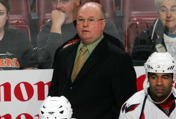 PHILADELPHIA - NOVEMBER 23:  Interim head coach Bruce Boudreau of the Washington Capitals looks on from the bench as his team plays against the Philadelphia Flyers on November 23, 2007 at Wachovia Center in Philadelphia, Pennsylvania.  (Photo by Jim McIsaac/Getty Images)