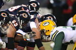 CHICAGO - DECEMBER 22: Members of the Chicago Bear offensive line including John Tait #76 and Roberto Garza #63, line-up in front of the Green Bay Packer defense on December 22, 2008 at Soldier Field in Chicago, Illinois. The Bears defeated the Packers 20-17 in overtime. (Photo by Jonathan Daniel/Getty Images)