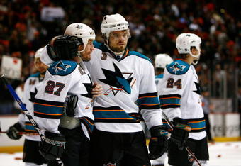 ANAHEIM, CA - APRIL 27:  Jeremy Roenick #27 and Douglas Murray #3 of the San Jose Sharks console each other after being eliminated from the playoffs by the Anaheim Ducks during Game Six of the Western Conference Quarterfinal Round of the 2009 Stanley Cup Playoffs at the Honda Center on April 27, 2009 in Anaheim, California.  (Photo by Jeff Gross/Getty Images)