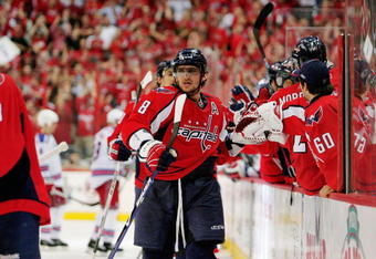 WASHINGTON - APRIL 28:  Alex Ovechkin #8 of the Washington Capitals celebrates the game winning goal with his teammates against the New York Rangers during Game Seven of the Eastern Conference Quarterfinal Round of the 2009 Stanley Cup Playoffs on April 28, 2009 at the Verizon Center in Washington,  DC.  (Photo by Len Redkoles/Getty Images)