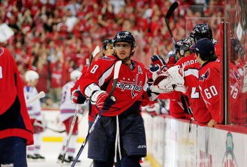 WASHINGTON - APRIL 28:  Alex Ovechkin #8 of the Washington Capitals celebrates the game winning goal with his teammates against the New York Rangers during Game Seven of the Eastern Conference Quarterfinal Round of the 2009 Stanley Cup Playoffs on April 28, 2009 at the Verizon Center in Washington,  DC.  (Photo by Len Redkoles/Getty Images)