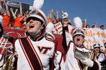 JACKSONVILLE, FL - DECEMBER 1:  The Virginia Tech band cheers on the field as the Virginia Tech Hokies tie the game just before half-time while taking on the Boston College Eagles in the ACC Championship Game at Jacksonville Municipal Stadium December 1, 2007 in Jacksonville, Florida. Virginia Tech defeated Boston College 30-16.  (Photo by Doug Benc/Getty Images)