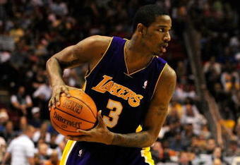 ORLANDO, FL - DECEMBER 20:  Trevor Ariza #3 of the Los Angeles Lakers looks to pass in a game against the Orlando Magic on December 20, 2008 at Amway Arena in Orlando, Florida.  NOTE TO USER: User expressly acknowledges and agrees that, by downloading and/or using this Photograph, user is consenting to the terms and conditions of the Getty Images License Agreement.  (Photo by Sam Greenwood/Getty Images)