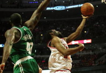CHICAGO - APRIL 26: John Salmons #15 of the Chicago Bulls puts up a shot past Kendrick Perkins #43 of the Boston Celtics in Game Four of the Eastern Conference Quarterfinals during the 2009 NBA Playoffs at the United Center on April 26, 2009 in Chicago, Illinois. The Bulls defeated the Celtics 121-118 in double overtime. NOTE TO USER: User expressly acknowledges and agreees that, by downloading and/or using this Photograph, User is consenting to the terms and conditions of the Getty Images License Agreement. (Photo by Jonathan Daniel/Getty Images)