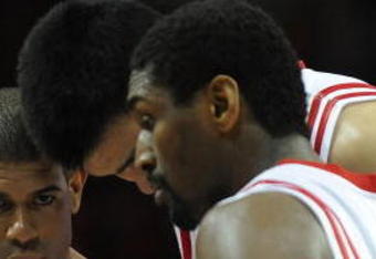 HOUSTON - APRIL 24:  Forward Shane Battier #31 huddles with Aaron Brooks #0, Luis Scola #4, Yao Ming #11 and Ron Artest #96 of the Houston Rockets in Game Three of the Western Conference Quarterfinals during the 2009 NBA Playoffs at Toyota Center on April 24, 2009 in Houston, Texas. NOTE TO USER: User expressly acknowledges and agrees that, by downloading and or using this photograph, User is consenting to the terms and conditions of the Getty Images License Agreement.  (Photo by Ronald Martinez/Getty Images)