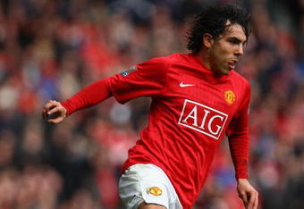 MANCHESTER, UNITED KINGDOM - MARCH 14:  Carlos Tevez of Manchester United in action during the Barclays Premier League match between Manchester United and Liverpool at Old Trafford on March 14, 2009 in Manchester, England.  (Photo by Laurence Griffiths/Getty Images)